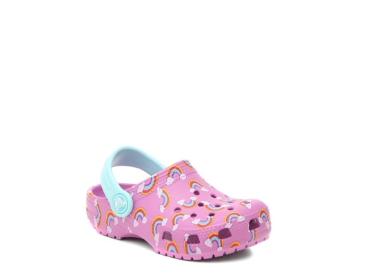 white crocs with rainbow writing